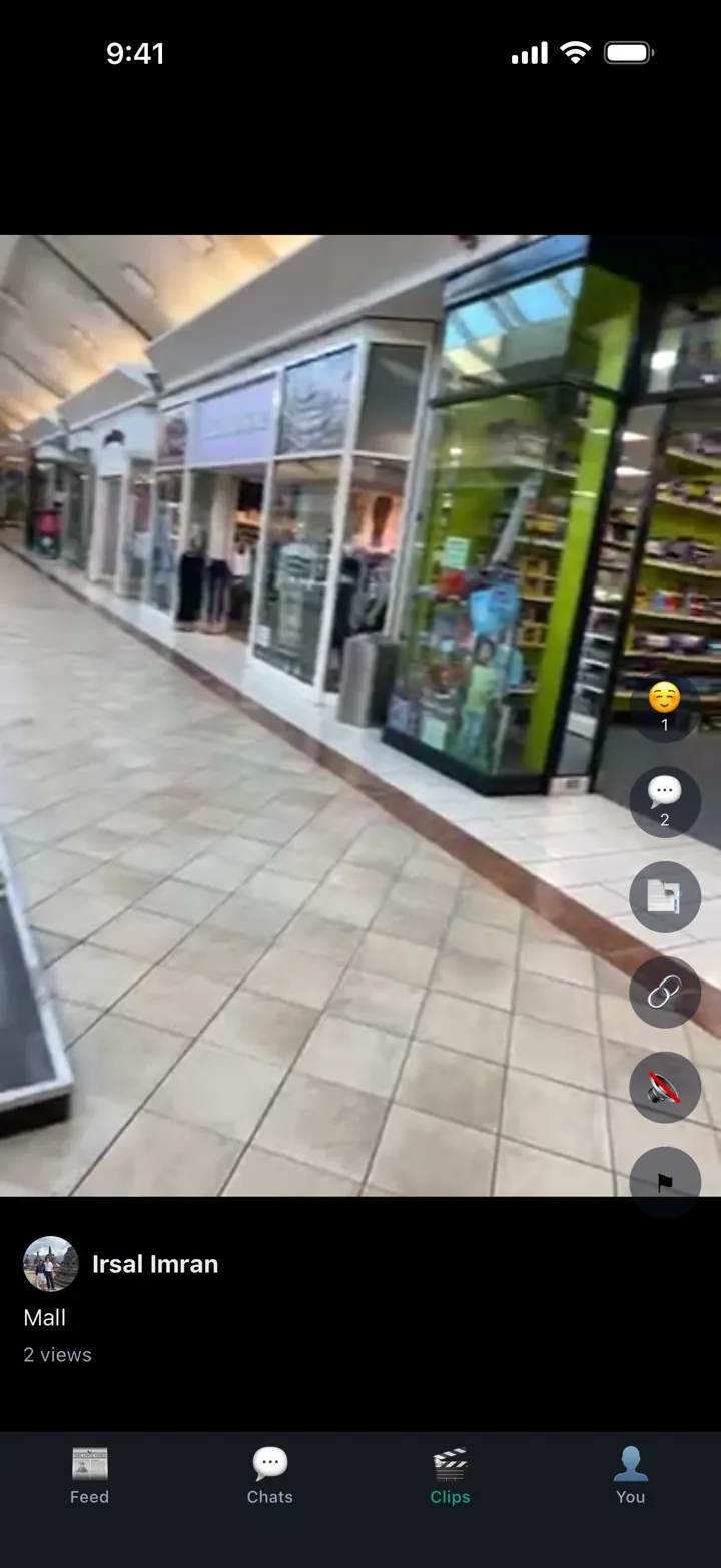 A clip playing full screen, with buttons to react, comment, save and share down the side.